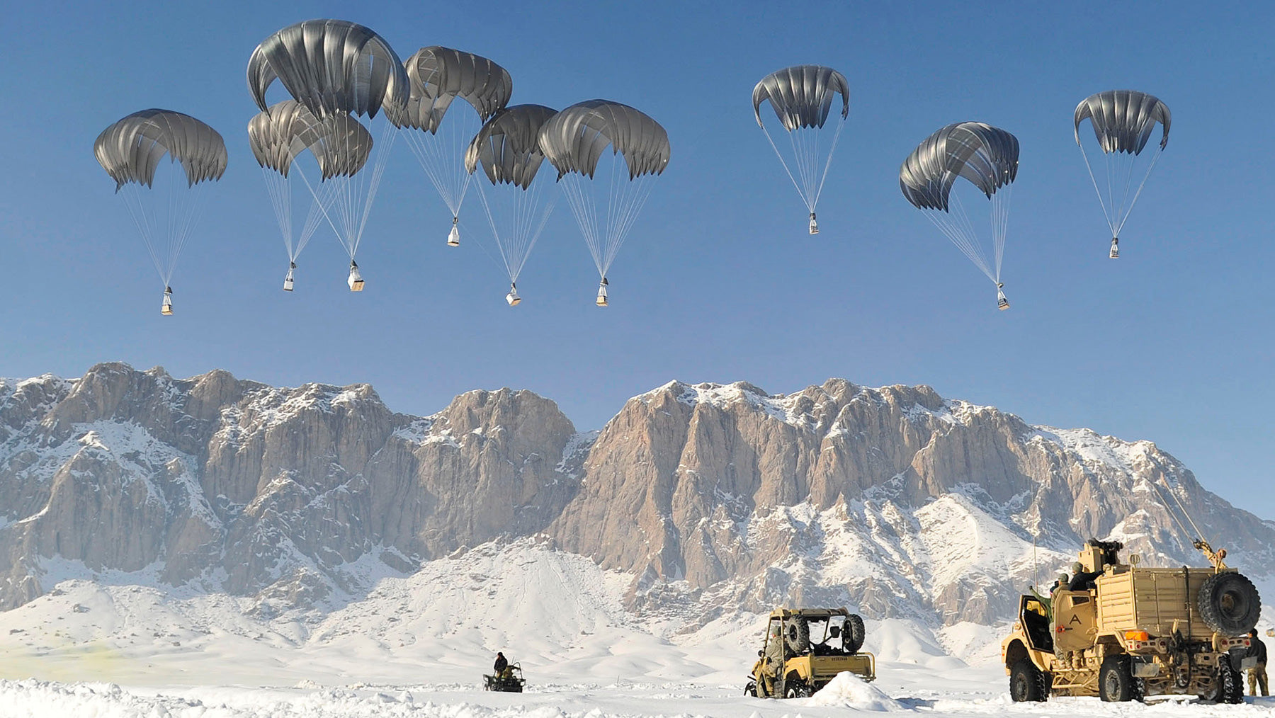 US Military airdrops supplies to troops in Afghanistan using Low Velocity Cargo Parachutes