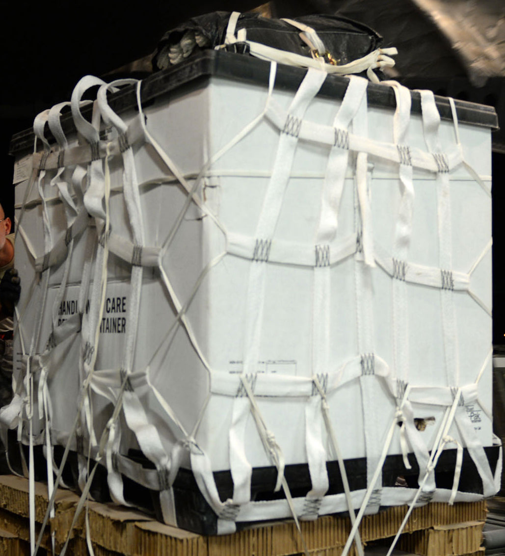 Low Cost Container shown here rigged up and ready to be airdropped out of the plane.