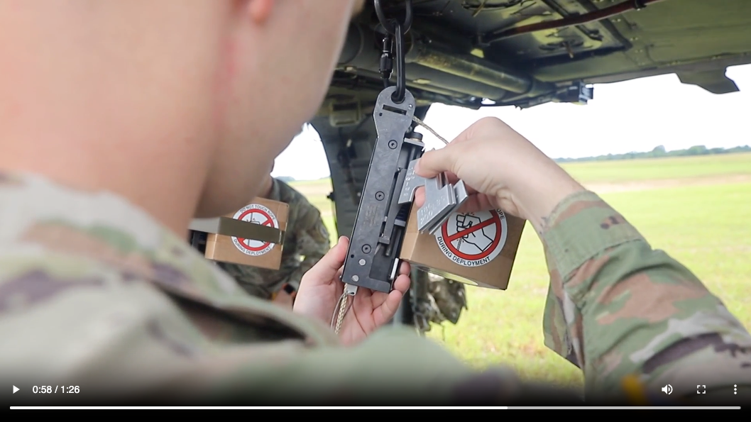 Load video: A demonstration showing how our Enhanced Speed Bag System and our LCLA Parachutes can deliver supplies from a Black Hawk Helicopter.
